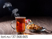 Turkish tea and sweets on a wooden table. Стоковое фото, фотограф Андрей Никитин / Фотобанк Лори