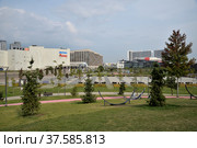 Moscow, Russia, August 28, 2021:  View of shopping and entertainment center Aviapark from Khodynskoye field - Moscow park in southern part of historic area of same name. Редакционное фото, фотограф Алексей Антипов / Фотобанк Лори