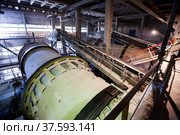 Grey factory mill in factory workshop of phosphoric fertilizers plant. Panorama view. No people. Стоковое фото, фотограф Alexey Rezvykh / Фотобанк Лори