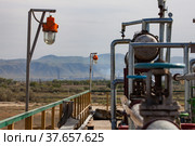 Oil refinery plant on sky and mountain background. Kazakhstan, Taraz city. Стоковое фото, фотограф Alexey Rezvykh / Фотобанк Лори