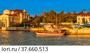 A pleasure sailing schooner is moored at the Kornilov Embankment in Sevastopol   Прогулочная парусная шхуна пришвартована у набережной Корнилова в Севастополе (2020 год). Редакционное фото, фотограф Владимир Ушаров / Фотобанк Лори
