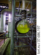 Pavlodar, Kazakhstan - May 29 2012: Caustic chemical plant. Chemical reactor for sodium hypochlorite production. Стоковое фото, фотограф Alexey Rezvykh / Фотобанк Лори