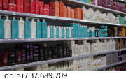 Assortment of haircare products and wigs at cosmetics store (2020 год). Редакционное видео, видеограф Яков Филимонов / Фотобанк Лори