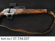 Smoothbore hunting gun on black background close up. Стоковое фото, фотограф Сергей Толмачёв / Фотобанк Лори