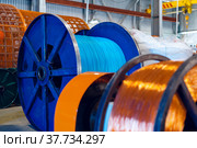 Production of copper wire, cable in reels at factory. Cable factory. Стоковое фото, фотограф Сергей Толмачёв / Фотобанк Лори