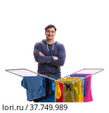Husband man doing laundry isolated on white. Стоковое фото, фотограф Elnur / Фотобанк Лори