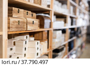 Wooden caskets on supermarket shelves. Стоковое фото, фотограф Яков Филимонов / Фотобанк Лори