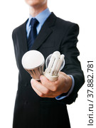 Businessman with fluorescent and LED lamps and incandescent. Стоковое фото, фотограф Станислав Тарко / Фотобанк Лори