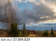 Panorama of village on Klin-Dmitrovsky ridge with clouds in early spring, Sergiev Posad district, Moscow region, Russia. Стоковое фото, фотограф Алексей Антипов / Фотобанк Лори