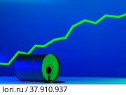 Price of american oil is changing concept. Black barrel with oil and graph. Стоковое фото, фотограф Сергей Толмачёв / Фотобанк Лори