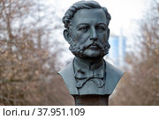 MINSK, BELARUS - FEBRUARY 20, 2022: Bust of Henry Dunant, the founder of the Red Cross organization on a street in Minsk. Редакционное фото, фотограф Denis Shitikoff / Фотобанк Лори