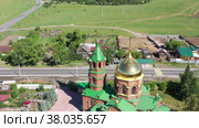Flight over the Church of St. Nicholas the Wonderworker in the village of Mezenskoye. Russia (2021 год). Стоковое видео, видеограф Евгений Ткачёв / Фотобанк Лори