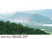 Natural landscape of Kunashir island, view of the Golovnin volcano caldera with hot lakes. Стоковое фото, фотограф Евгений Харитонов / Фотобанк Лори