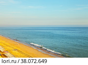 Top view of the beautiful Praia da Falésia beach with sun beds at the shallow sandy seashore. Vilamoura, Algarve, Portugal. Natural background. Summer holiday by the sea (2012 год). Стоковое фото, фотограф Виктория Катьянова / Фотобанк Лори