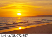 Magnificent bright golden sunset on the shores of the Atlantic Ocean. Natural summer background. Beautiful beach landscape. View from above. Стоковое фото, фотограф Виктория Катьянова / Фотобанк Лори