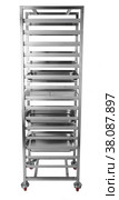 Metal Industrial kitchen rack isolated on white background. Стоковое фото, фотограф Сергей Толмачёв / Фотобанк Лори