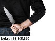 Person hairy skin chef holding kitchen knife hidden behind the back. Стоковое фото, фотограф Camptoloma / Фотобанк Лори