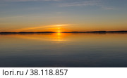 Landscape on the lake at sunset with reflection. Стоковое фото, фотограф Михаил Аккуратoв / Фотобанк Лори