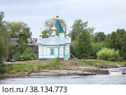 Православный Храм во имя Преподобных Зосимы, Савватия и Германа Соловецких. Остров Сорока, река Нижний Выг, город Беломорск, Карелия (2022 год). Редакционное фото, фотограф Кекяляйнен Андрей / Фотобанк Лори