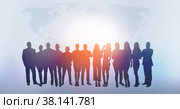 Creative image of silhouettes of businesspeople standing together on abstract background. Стоковое фото, фотограф Сергей Толмачёв / Фотобанк Лори