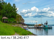 Pleasure boat on the banks of the Tom river in the Museum-reserve "Tomsk Pisanitsa" Стоковое фото, фотограф Ольга Остроухова / Фотобанк Лори