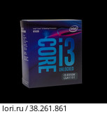 Maykop, Russia - November 12, 2018: intel core I3 desktop processor 8th gen in box isolated on black background. Редакционное фото, фотограф Андрей С / Фотобанк Лори
