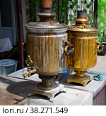 Samovars with a century-old history prepare tea in a rural teahouse in Kyrgyzstan. Стоковое фото, фотограф Сергей Фролов / Фотобанк Лори