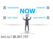 Concept of procrastination with now or later. Стоковое фото, фотограф Elnur / Фотобанк Лори