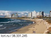 View of Tel Aviv with urban development and people on the beach by the Mediterranean Sea. Israel (2017 год). Стоковое фото, фотограф Наталья Волкова / Фотобанк Лори