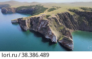 Aerial view on cape Sagan-Khushun on Olkhon island. Summer landscape of lake Baikal. (2022 год). Редакционное видео, видеограф Mixail59 / Фотобанк Лори