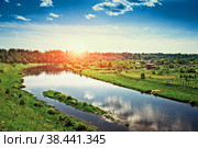 Sunset cuts through the clouds over the river Volga. Rzhev. Стоковое фото, фотограф Алексей Сорокин / Фотобанк Лори