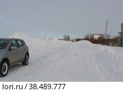 Зимний пейзаж, расчищенная от свежего снега дорога в Волгоградской области, после метели в степи. Стоковое фото, фотограф Андрей Цыганков / Фотобанк Лори