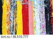 Background as handmade doormat from strips of cloth. Стоковое фото, фотограф FotograFF / Фотобанк Лори