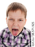 Portrait of the disobedient boy who is putting out the tongue. Стоковое фото, фотограф Станислав Типляшин / Фотобанк Лори