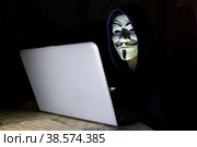 Россия. Санкт-Петербург. Имитация хакера за работой. Информационная и компьютерная безопасность. Russia. Saint-Petersburg. Imitation of a hacker at work. Information and computer security. Стоковое фото, фотограф Алексей Смышляев / Фотобанк Лори