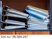 Folders binders with documents are on the shelf. Стоковое фото, фотограф Дмитрий Коростылев / Фотобанк Лори