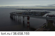 Объездной мост через реку. Платная дорога. Промышленный вид. Видео с дрона. Санкт-Петербург. Стоковое видео, видеограф Александр Сапыгин / Фотобанк Лори