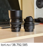 KRASNOYARSK, RUSSIA - November 21, 2019: Two lenses. Canon EF 50 mm STM and EF 85 mm F1.8. Редакционное фото, фотограф Плотников Дмитрий / Фотобанк Лори