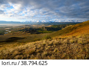 Panoramic sunrise landscape of Kurai steppe with chuya river, mountain ice peaks of Siberia and sunny sky of Altai background. Russia scenery concept of autumn mountain forest nature. Altai, Siberia. Стоковое фото, фотограф Евгений / Фотобанк Лори