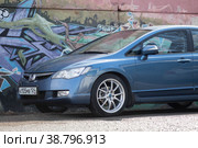 KRASNOYARSK, RUSSIA - March 30, 2022: Blue car. Sedan Honda Civic 4D FD1 2007. Beautifull wheels. Редакционное фото, фотограф Плотников Дмитрий / Фотобанк Лори