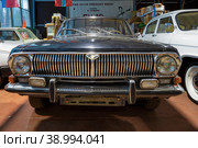 ZELENOGORSK, RUSSIA - JANUARY 27, 2023: Front part of the soviet car GAZ-24 Volga close-up. Museum of retro cars "Horsepower" Редакционное фото, фотограф Виктор Карасев / Фотобанк Лори