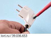 Collapsible design of European electrical plug for self assembly on power cord. Стоковое фото, фотограф Владимир Григорьев / Фотобанк Лори