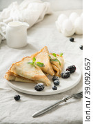 Tasty breakfast of sweet pancakes. Vertical format. Стоковое фото, фотограф Светлана Лажко / Фотобанк Лори