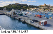 Паромный причал Гозо. (Gozo Ferry Terminal). Айнсилем. Остров Гоцо (Gozo). Республика Мальта (2023 год). Редакционное фото, фотограф lana1501 / Фотобанк Лори