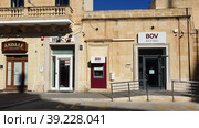 HSBC Bank.BOV. Bank of Valletta. Город Надур (Nadur). Остров Гоцо (Gozo). Республика Мальта (2023 год). Редакционное фото, фотограф lana1501 / Фотобанк Лори