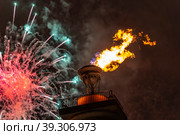Ростральная колонна на фоне салюта (2023 год). Редакционное фото, фотограф Михаил Богородский / Фотобанк Лори