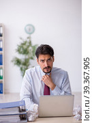 Young male employee in rejected ideas concept. Стоковое фото, фотограф Elnur / Фотобанк Лори
