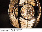 Close up photo.of a ;ighthouse lamp with a Fresnel lens. Стоковое фото, фотограф EugeneSergeev / Фотобанк Лори