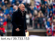 Выступление президента РФ Владимира Путина в рамках митинг-концерта "Слава защитникам Отечества", посвященного участникам спецоперации и празднованию Дня защитника Отечества на стадионе Лужники в городе Москве, Россия (2023 год). Редакционное фото, фотограф Андрей Дегтярёв / Фотобанк Лори