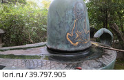 Video of bronze Shiva Linga in Toganji temple. Symbol of lingam-yoni. Nagoya. Japan. Стоковое видео, видеограф Сергей Пристяжнюк (Serg Zastavkin) / Фотобанк Лори